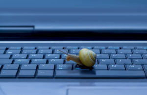 snail-moving-across-keyboard-to-show-slow-site-speed