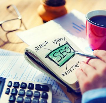 A notepad with the word SEO written on it