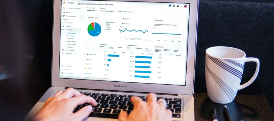 business owner reviewing performance max ads in Google Analytics 4