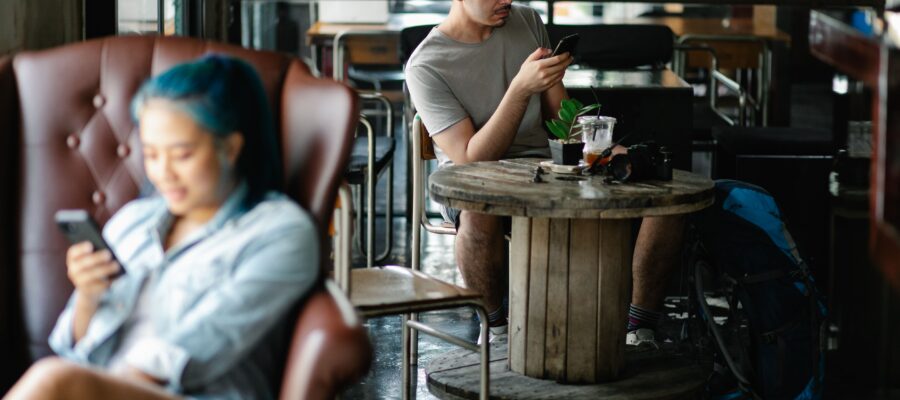 people interacting with their phone getting targeted by ads